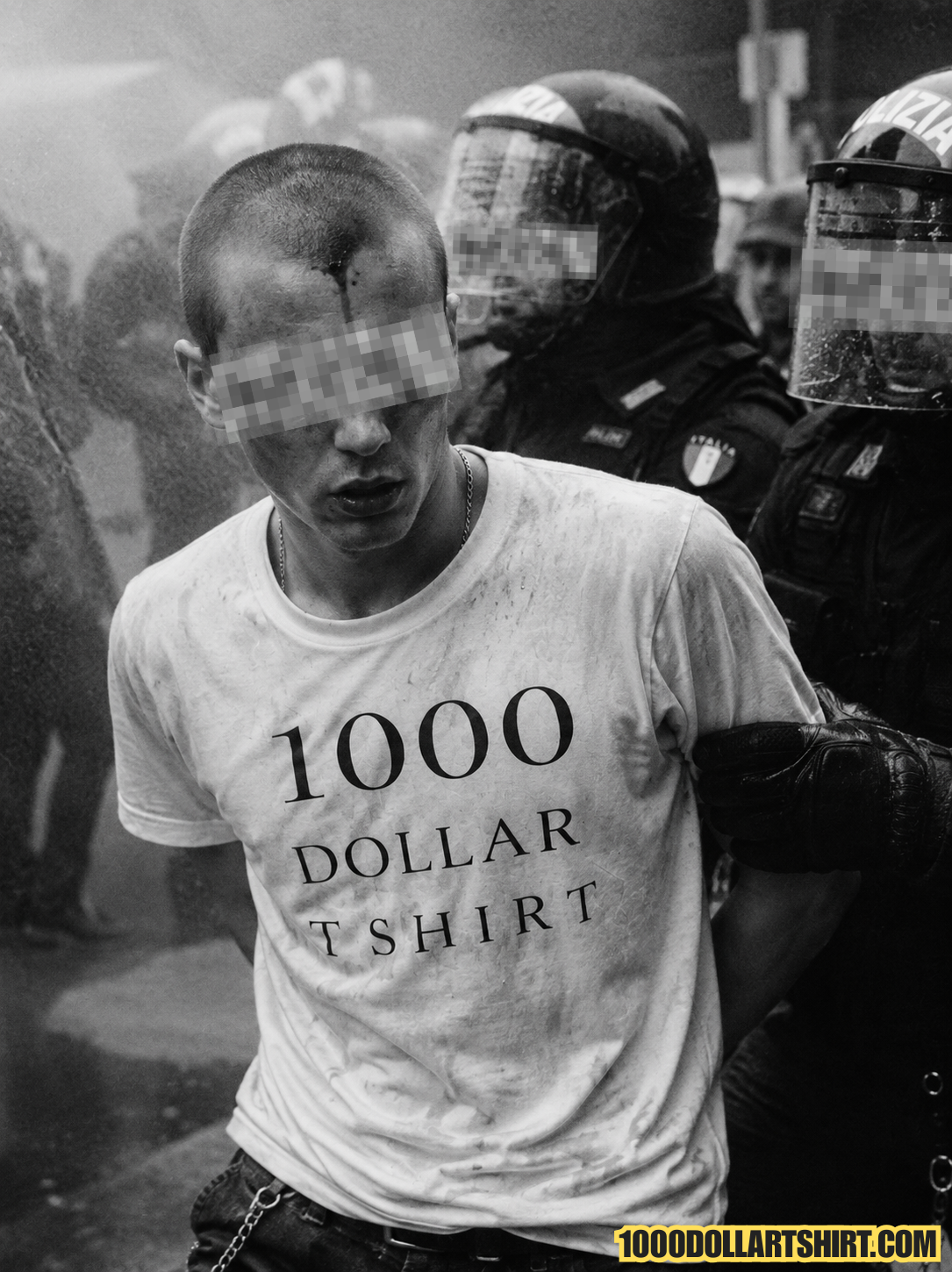 Black and white documentary photograph of a young man wearing a dirty 1000 Dollar T Shirt while being detained during a street protest, surrounded by riot police in protective gear.